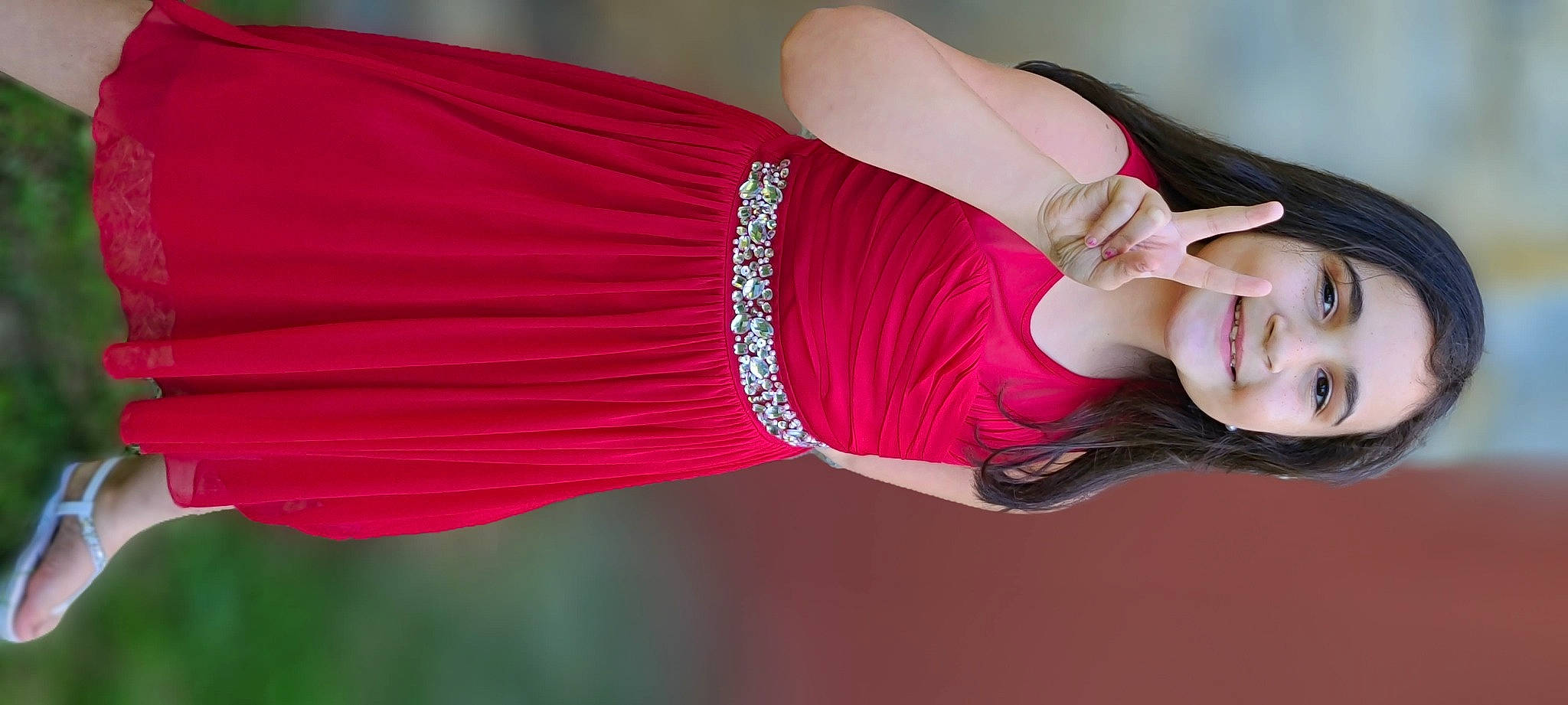 Ashton is registered to the contest to win money with this photo: abdomen, arm, clothing, elbow, event, eyelash, gesture, human_leg, joint, joy, knee, magenta, person, pink, shoulder, sleeve, smile, sportswear, thigh, trunk