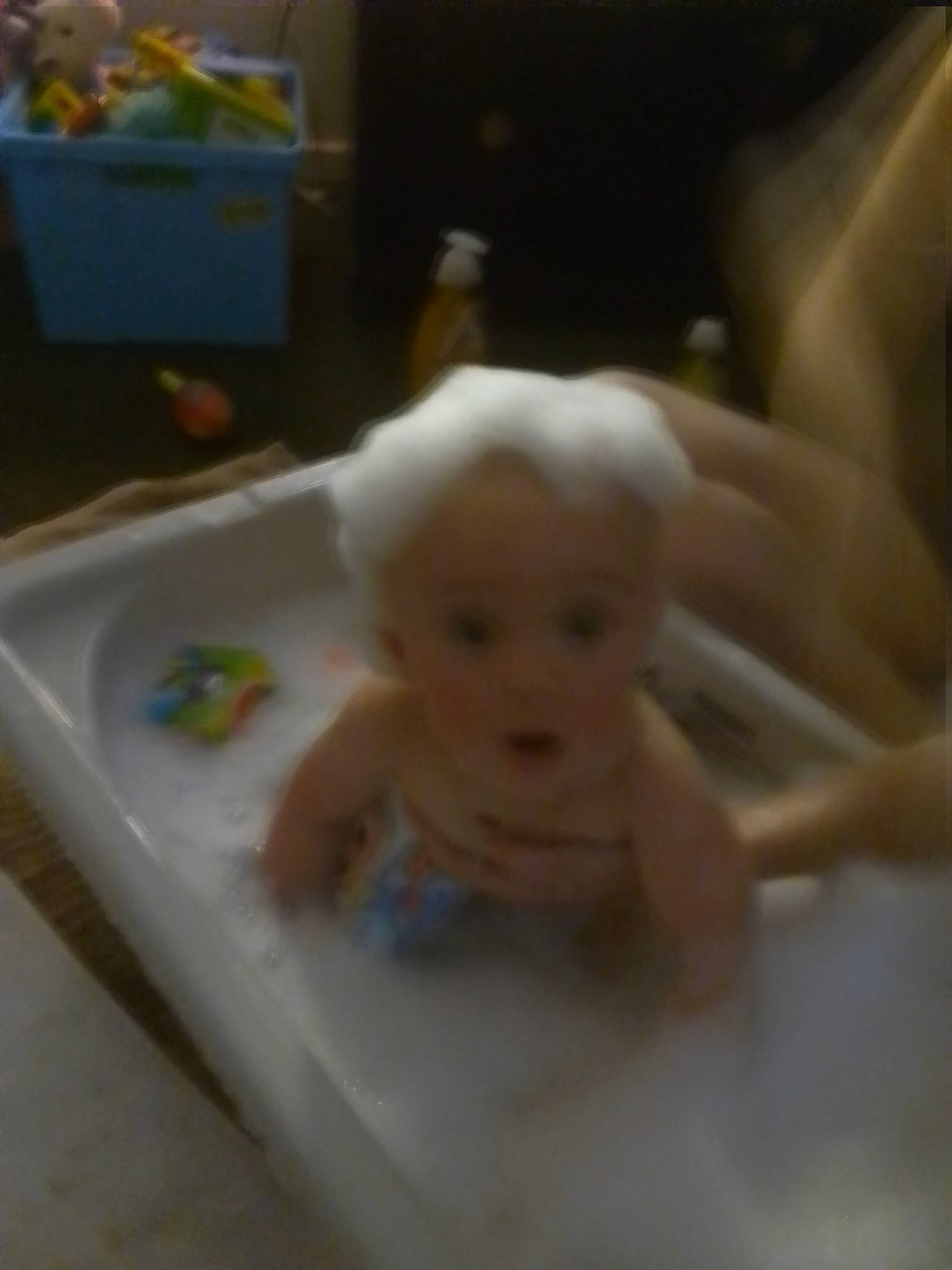 Ali is registered to the contest to win money with this photo: baby, baby_products, baby_safety, baby_toys, bathing, chest, flooring, fun, iris, person, plastic, surprise, thumb, toddler, toy, under_exposed, wood