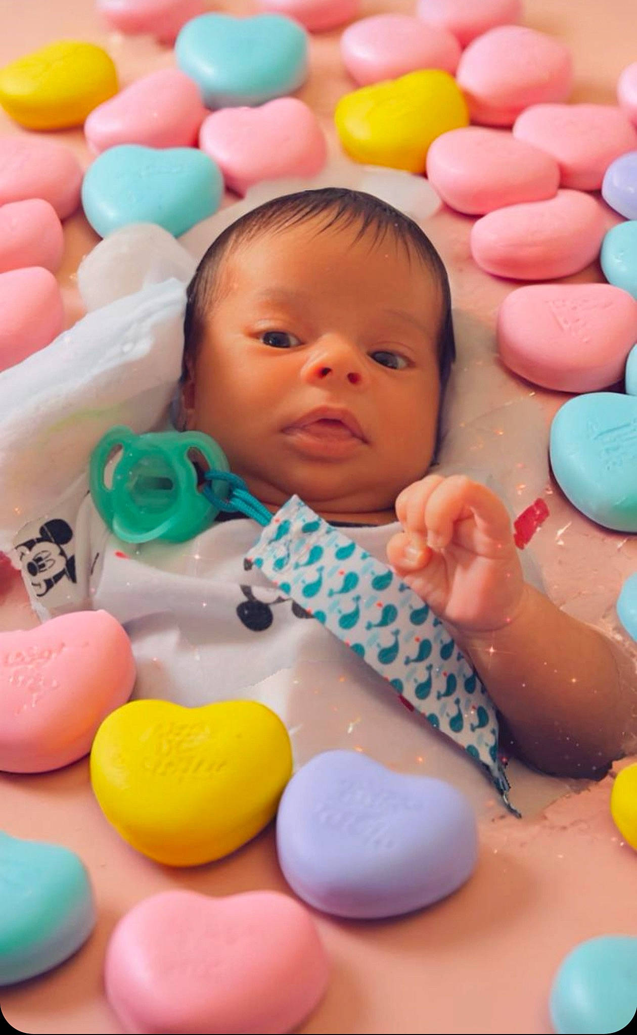Alexander is registered to the contest to win money with this photo: baby, baby_playing_with_toys, baby_products, baby_toddler_clothing, ball_pit, beauty, cheek, child, comfort, facial_expression, fun, happy, person, photograph, pink, play, skin, snapshot, sweetness, toddler