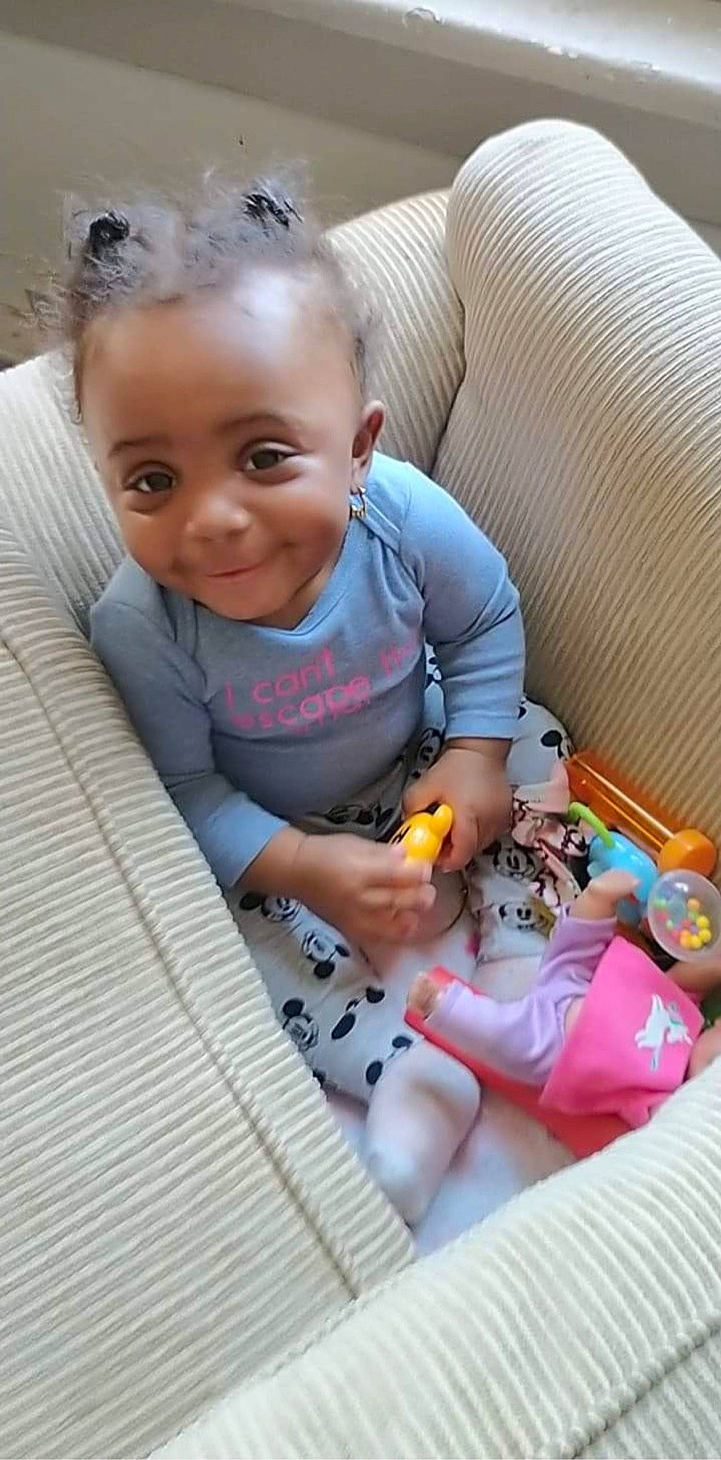 Zyella is registered to the contest to win money with this photo: baby, baby_products, baby_toddler_clothing, cheek, child, comfort, doll, flooring, fun, happy, joy, lap, linens, person, plush, product, room, sitting, skin, smile