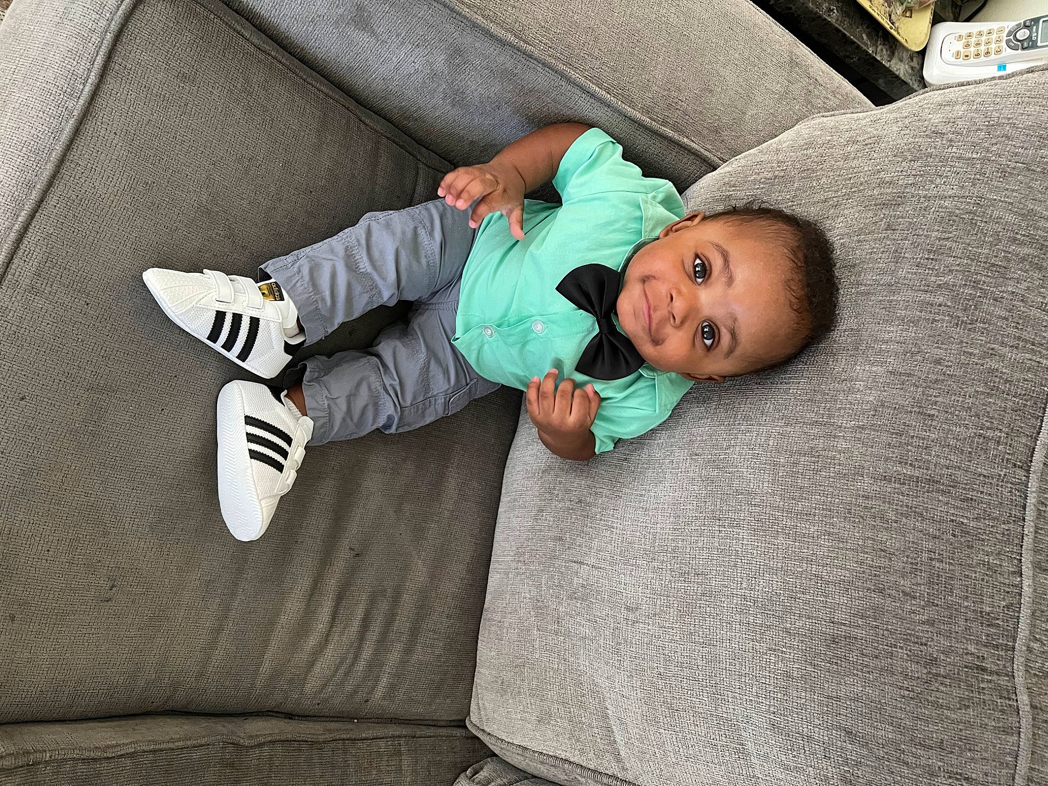 Zyell is registered to the contest to win money with this photo: baby, baby_toddler_clothing, child, comfort, couch, floor, flooring, grass, grey, linens, nap, person, room, sitting, sleep, sleeve, textile, throw_pillow, toddler, tree