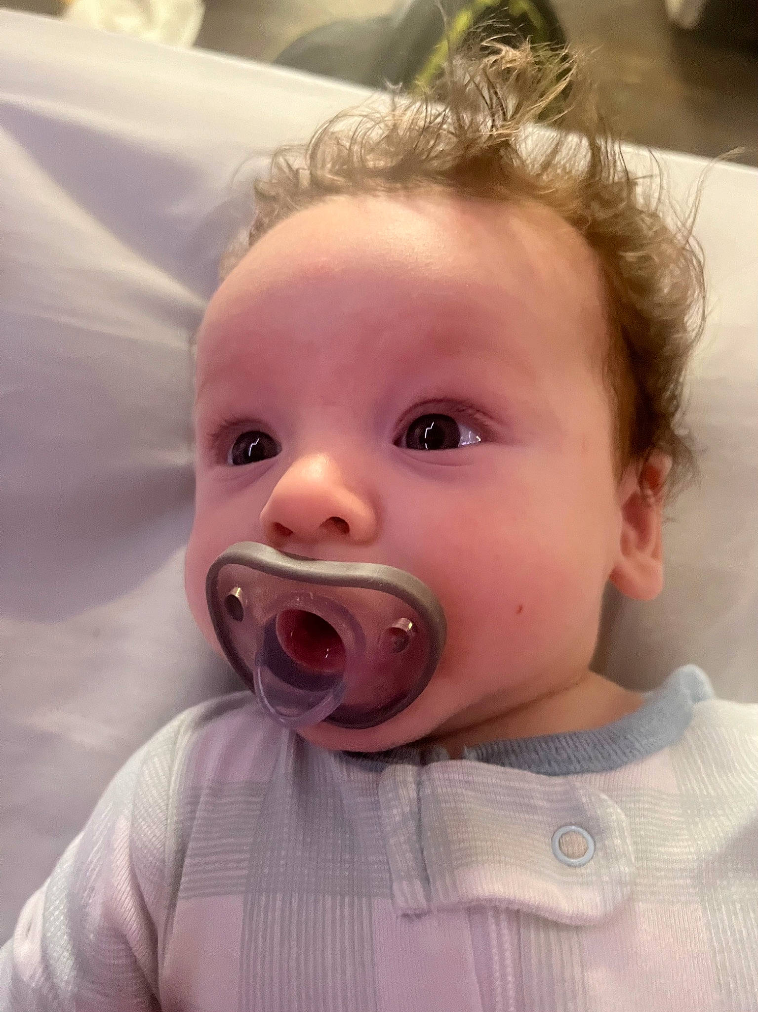 Saint is registered to the contest to win money with this photo: baby, baby_toddler_clothing, cheek, child, comfort, ear, eyebrow, eyelash, fun, gesture, happy, iris, linens, lip, mouth, nose, person, shout, skin, sleeve