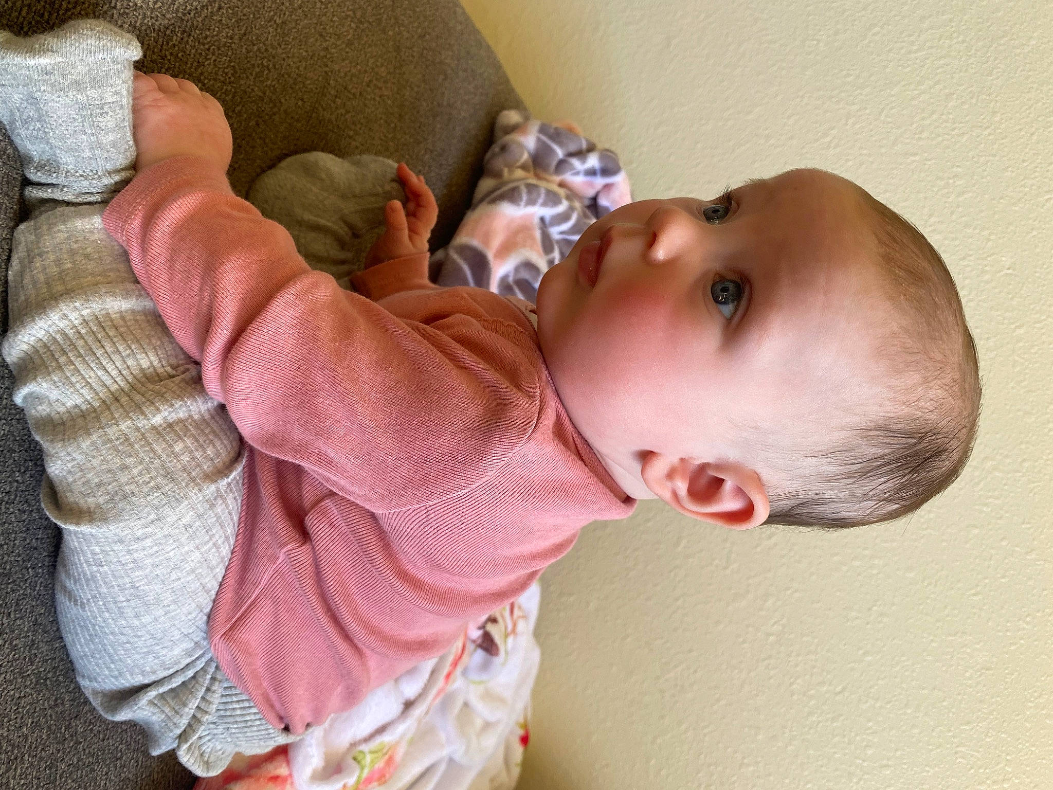 Jade is registered to the contest to win money with this photo: arm, baby, baby_products, baby_safety, baby_toddler_clothing, cheek, child, comfort, ear, eye, headgear, linens, nose, person, room, skin, sleep, sleeve, toddler, wood
