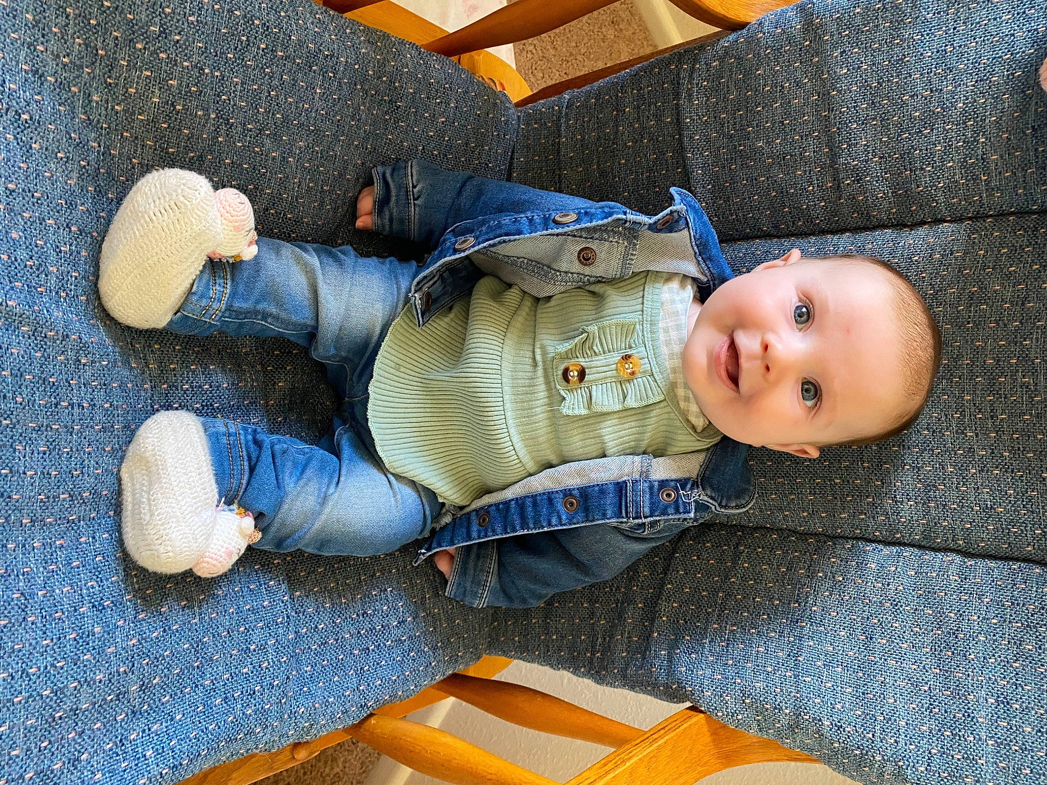 Jade is registered to the contest to win money with this photo: baby, baby_products, baby_toddler_clothing, baby_toys, child, comfort, denim, electric_blue, flooring, joy, lap, linens, pattern, person, room, sitting, sleep, toddler, toy, wood