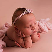 Ruby joined the competition — help win amazing prizes! baby, sleeping, newborn, headband, flower, pink, soft_fabric, cute, portrait, child, infant, peaceful, hands, face, skin, resting, closeup, studio, pose, adorable