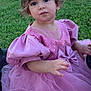 ángeles joined the competition — help win amazing prizes! toddler, child, pink_dress, princess, bow_headband, outdoor, grass, toy_car, curly_hair, portrait, cute, young_child, sunlight, play, seated, fashion, sparkles, puffy_sleeves, nature, small_person