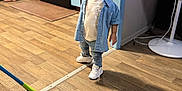 Tyler Ramirez joined the competition — help win amazing prizes! toddler, child, denim_shirt, jeans, cap, old_navy, kitchen, floor, fan, mop, wood_floor, appliances, person, indoor, clothing, footwear, expression, young_child, home, casual
