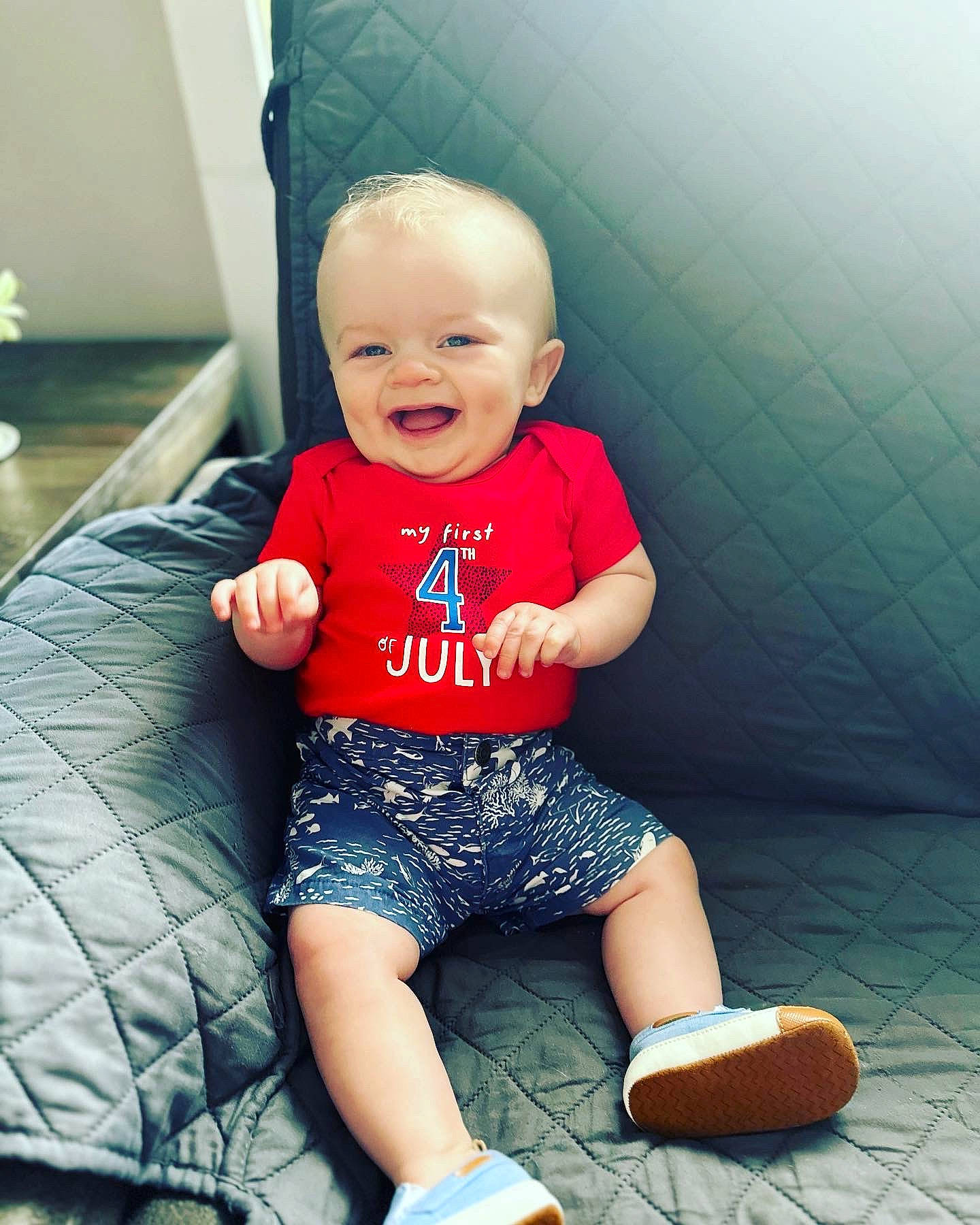 Jax is registered to the contest to win money with this photo: azure, baby, baby_toddler_clothing, cheek, cool, finger, flash_photography, flooring, fun, happy, joint, joy, knee, leg, person, shoulder, skin, sleeve, smile, t_shirt
