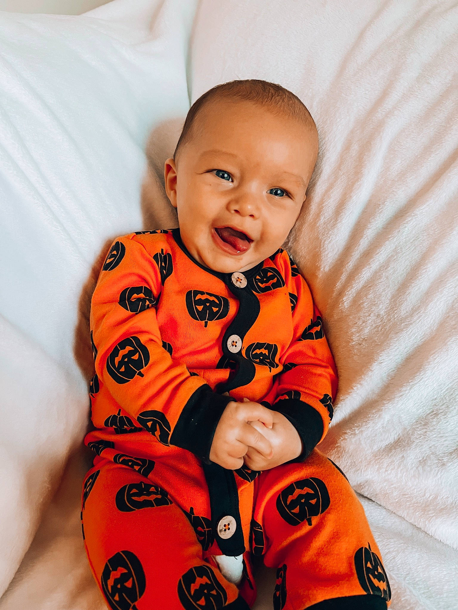 Camden joined the competition — help win amazing prizes! baby, baby_toddler_clothing, cheek, comfort, eye, flooring, happy, head, jersey, linens, neck, nose, orange, person, skin, sleeve, smile, sportswear, t_shirt, toddler