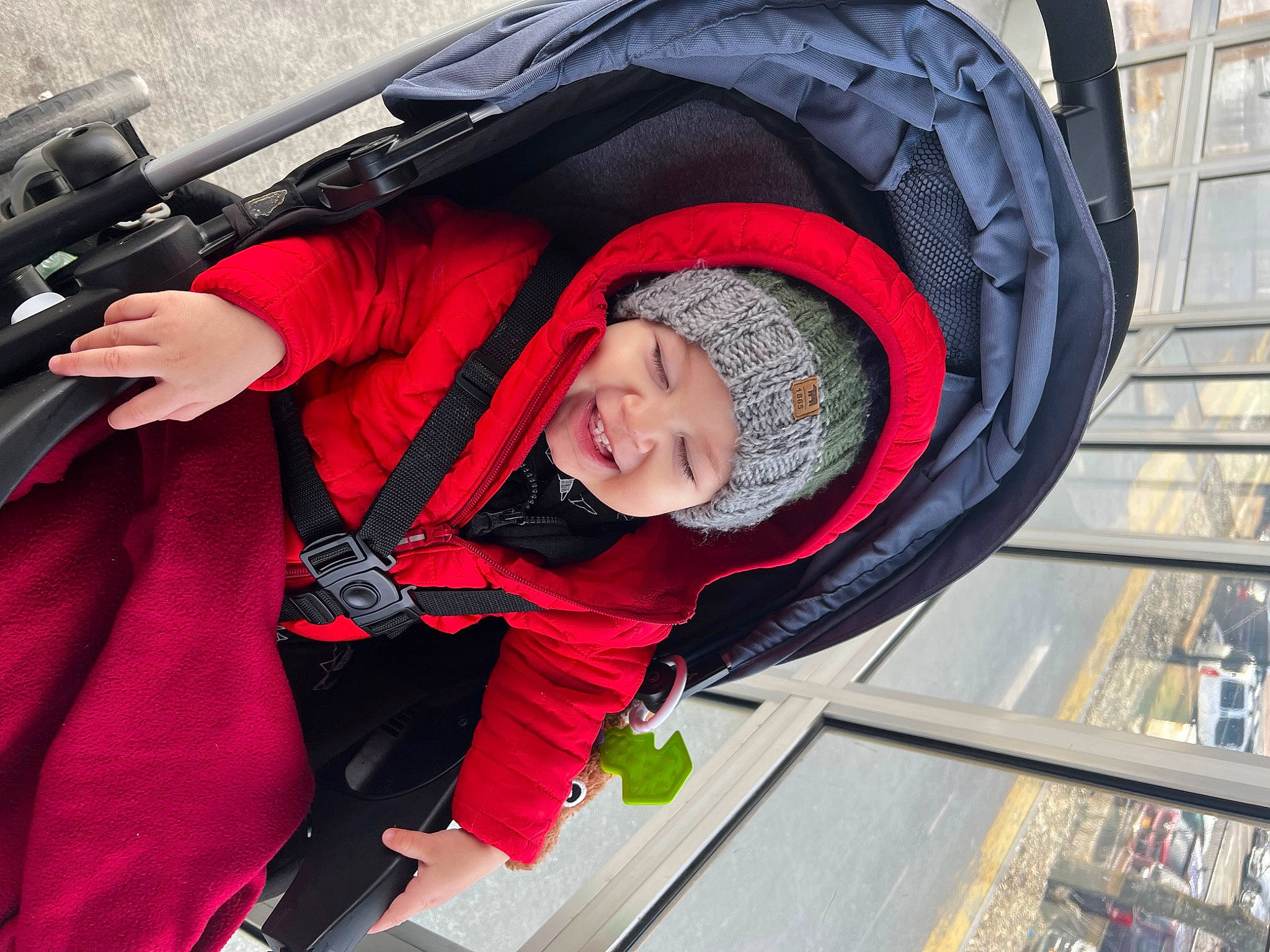 Marcellus joined the competition — help win amazing prizes! auto_part, automotive_tire, baby_carriage, baby_products, backpack, carmine, child, fashion_accessory, fun, headwear, hoodie, jacket, leisure, magenta, person, personal_protective_equipment, recreation, sleeve, smile, toddler
