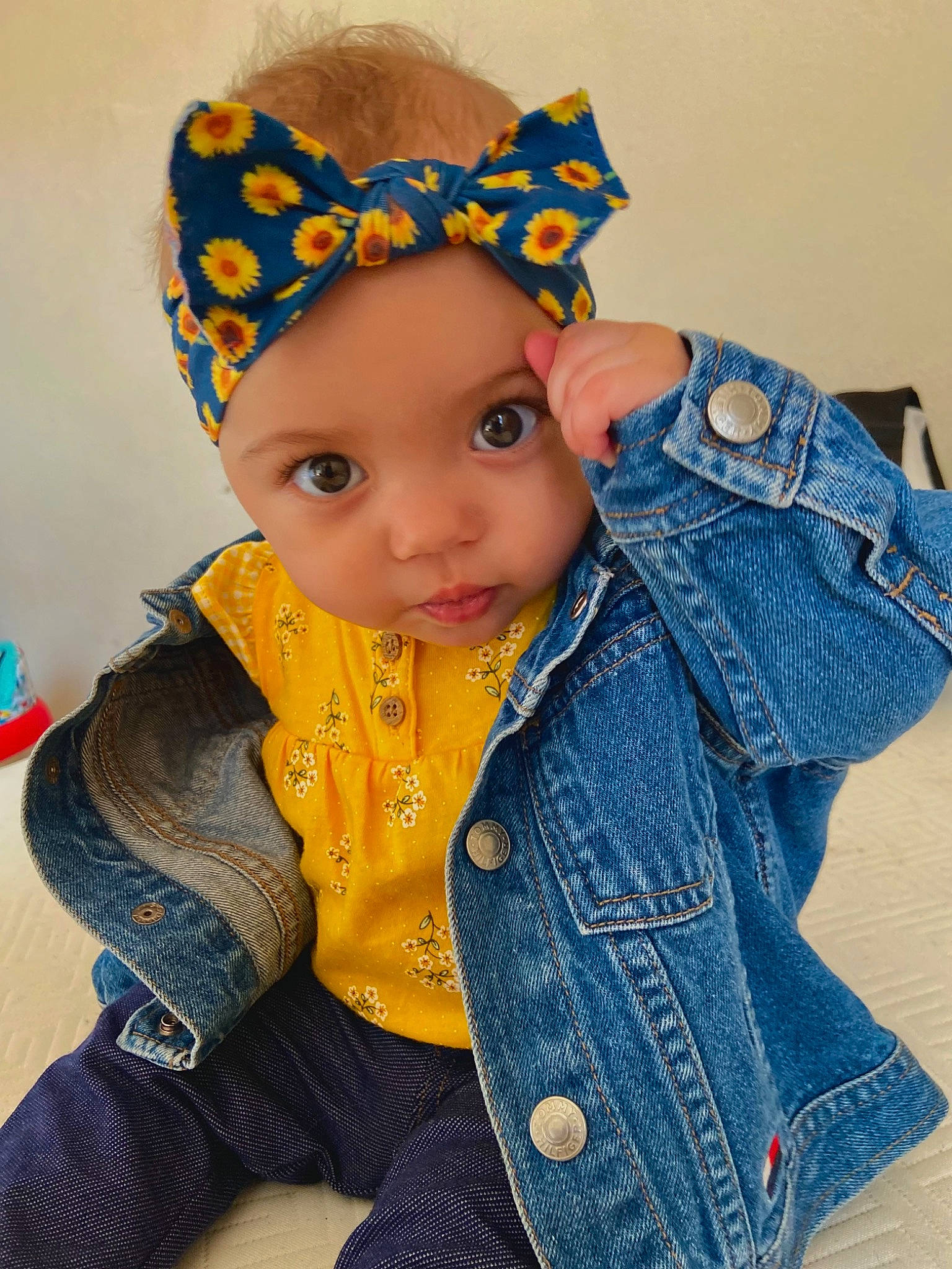 Elianna is registered to the contest to win money with this photo: baby, baby_toddler_clothing, cap, cheek, clothing, costume_hat, electric_blue, eye, face, facial_expression, head, headgear, headwear, iris, outerwear, pattern, person, product, skin, sleeve