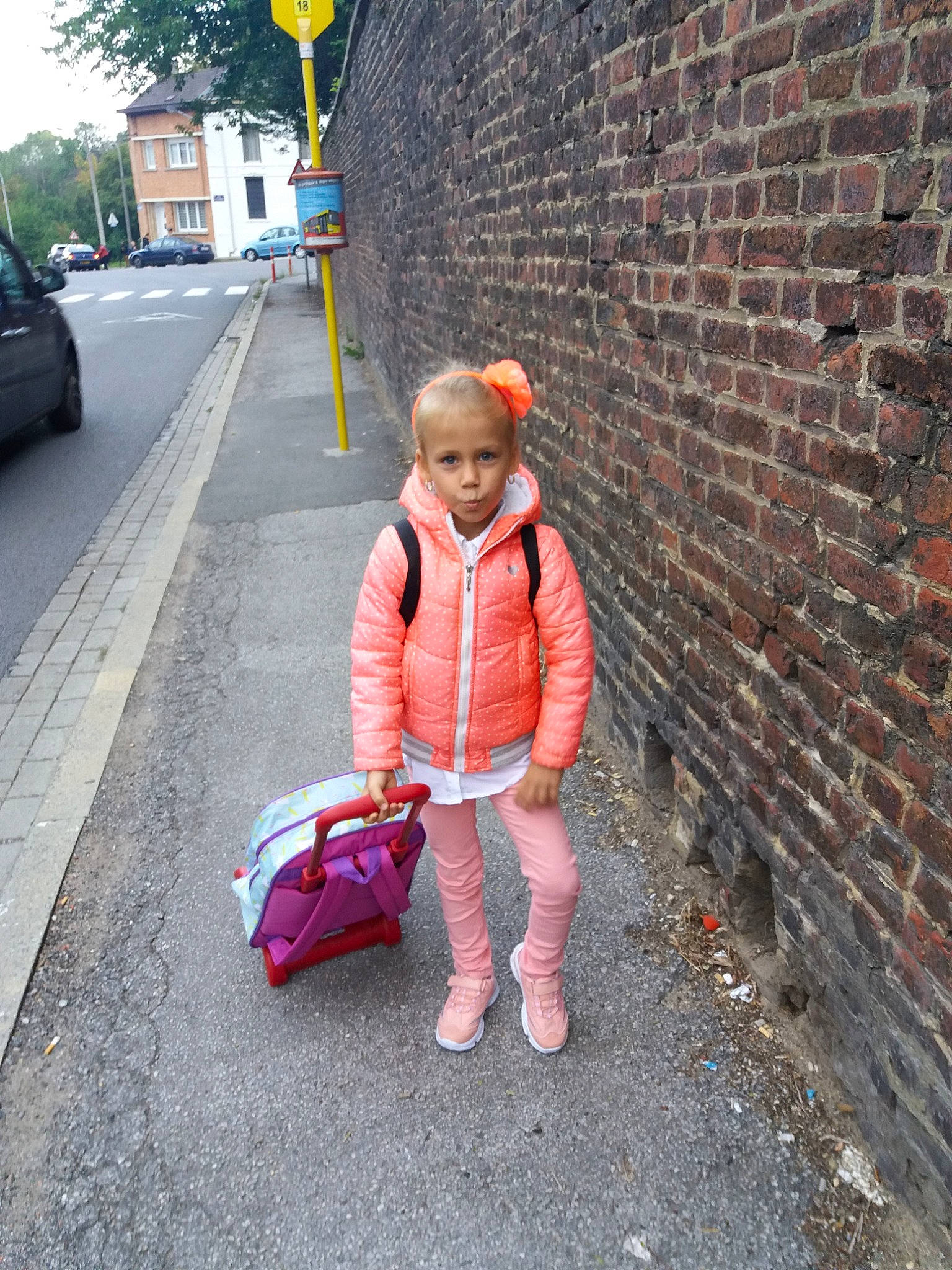 Laora a rejoint le concours — aidez-le/la à gagner de superbes lots ! asphalt, child, fun, girl, jeans, person, pink, play, public_space, recreation, red, road, sidewalk, sitting, snapshot, street, toddler, vacation