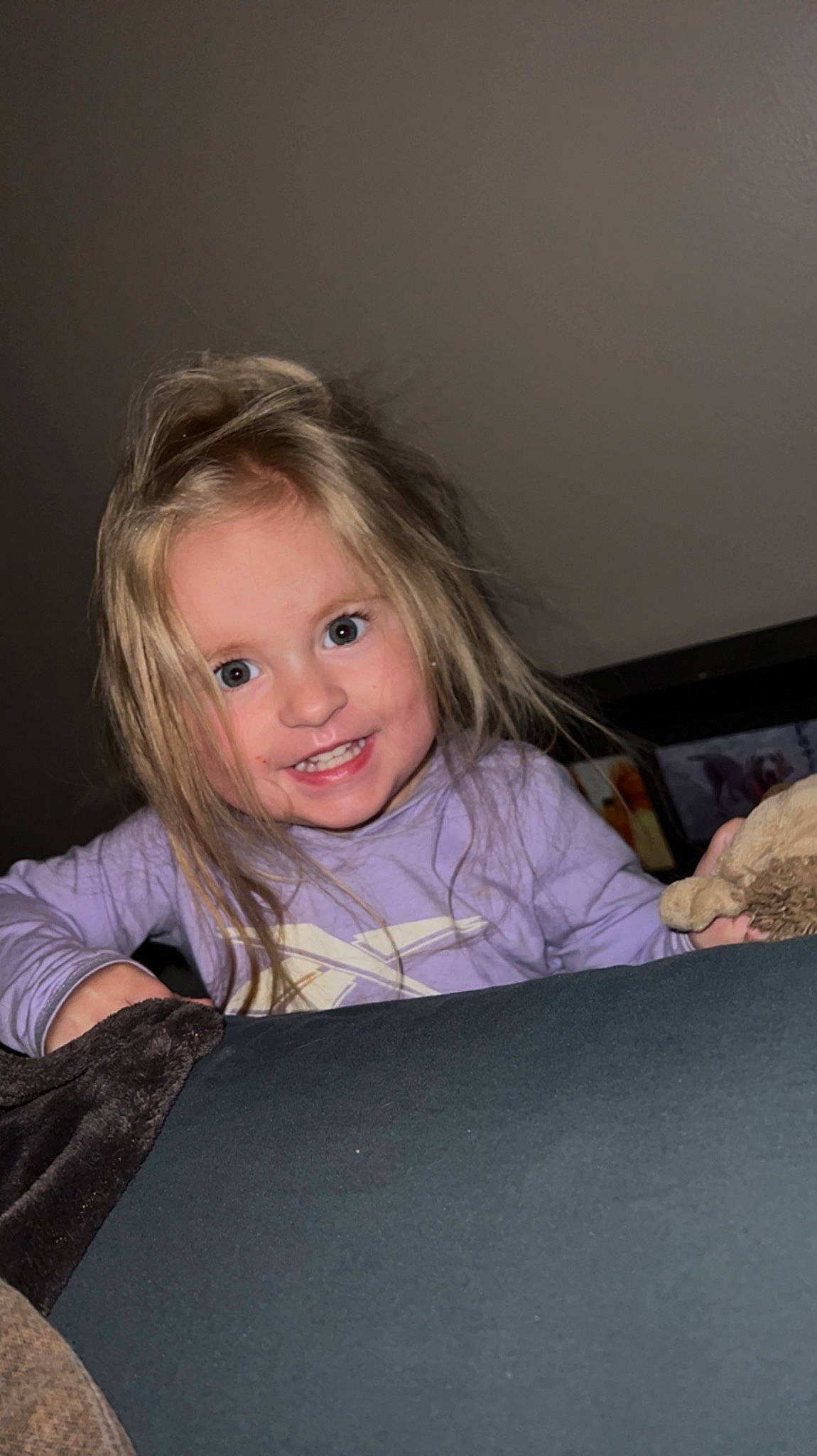 Elena is registered to the contest to win money with this photo: blond, brown_hair, cheek, child, eye, eyelash, flash_photography, flooring, fun, grass, happy, iris, joy, long_hair, person, room, sitting, smile, t_shirt, table