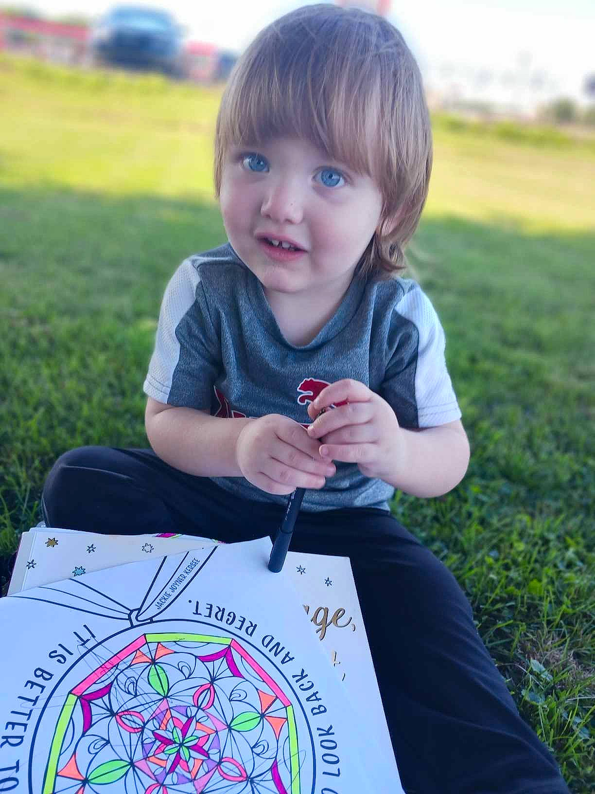 Zander is registered to the contest to win money with this photo: art, artist, child, fun, grass, green, handwriting, happy, leaf, leisure, pattern, people_in_nature, person, plant, play, recreation, spring, summer, t_shirt, toddler