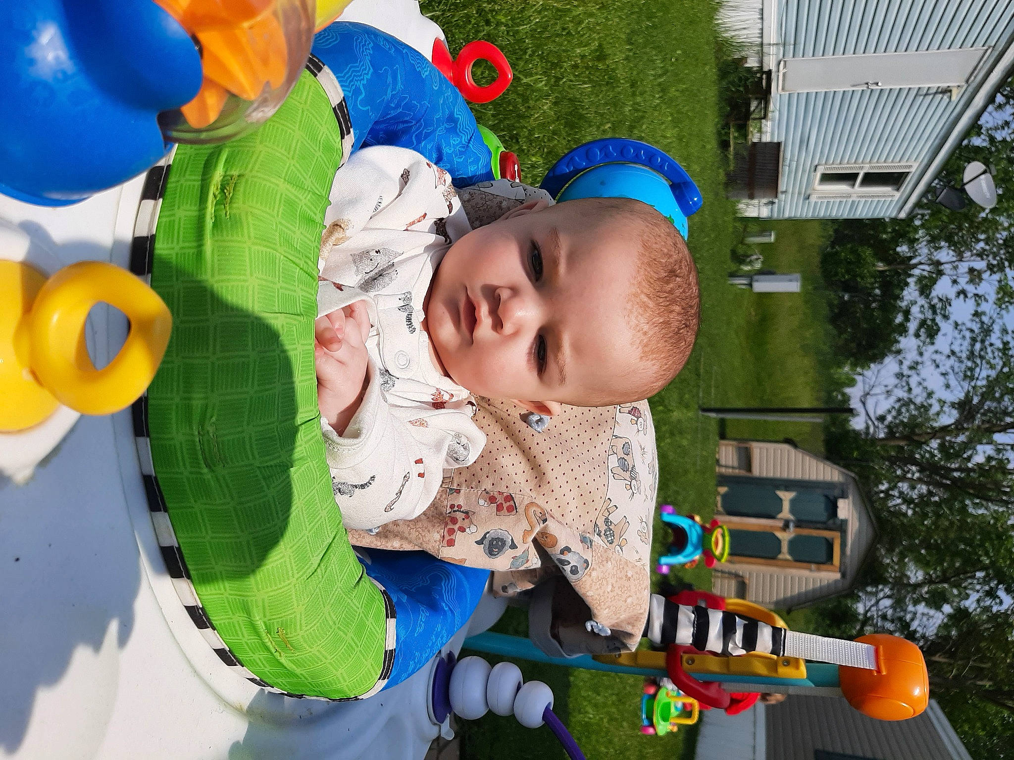 Izabella is registered to the contest to win money with this photo: baby, baby_products, baby_toddler_clothing, baby_toys, blue, child, city, event, facial_expression, fun, grass, happy, leisure, person, play, recreation, toddler, tree