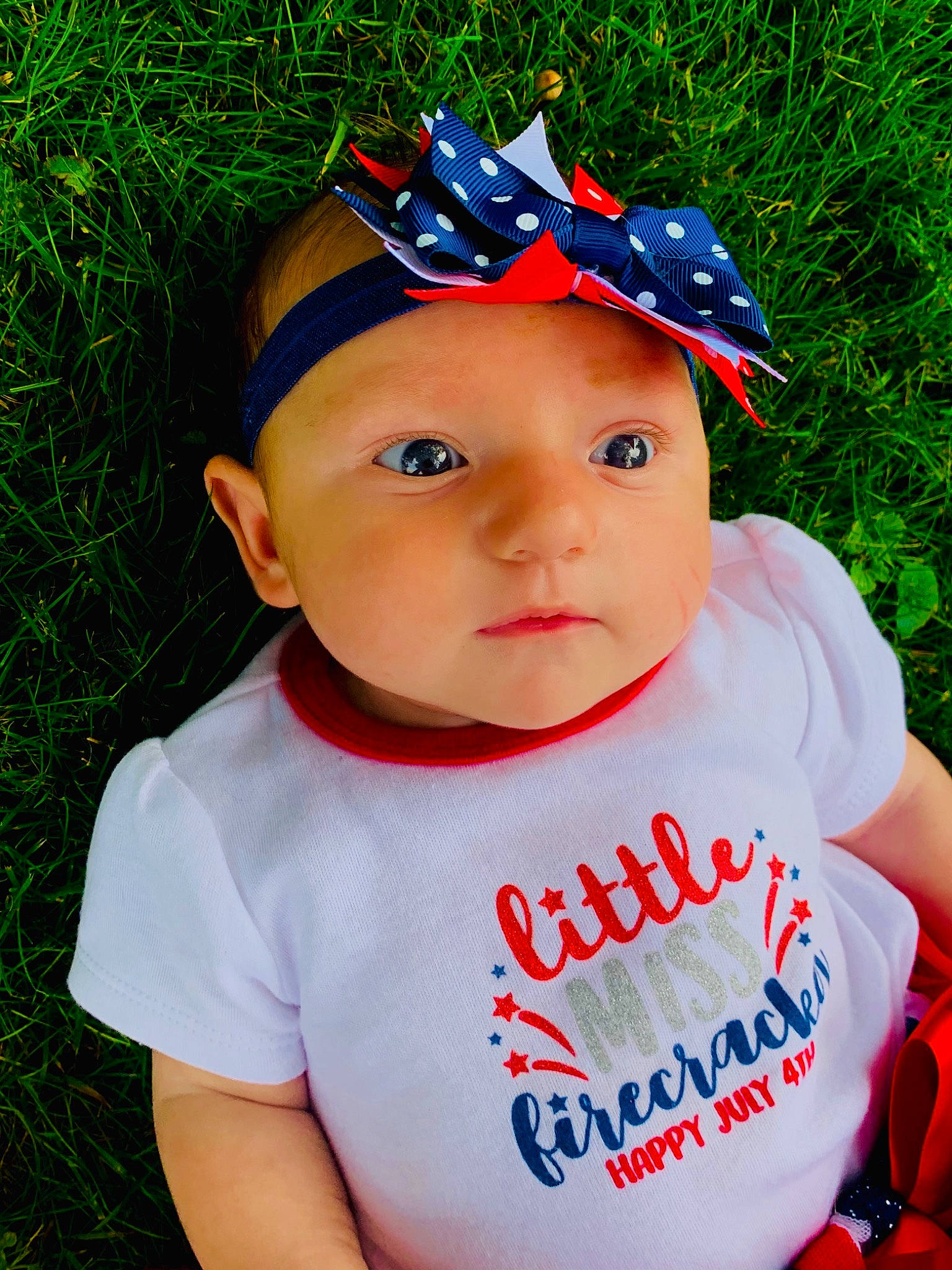 Anna is registered to the contest to win money with this photo: baby, baby_toddler_clothing, baseball_cap, cap, child, chin, cool, costume_hat, electric_blue, face, facial_expression, fashion_accessory, fun, grass, happy, hat, headgear, headwear, person, sleeve