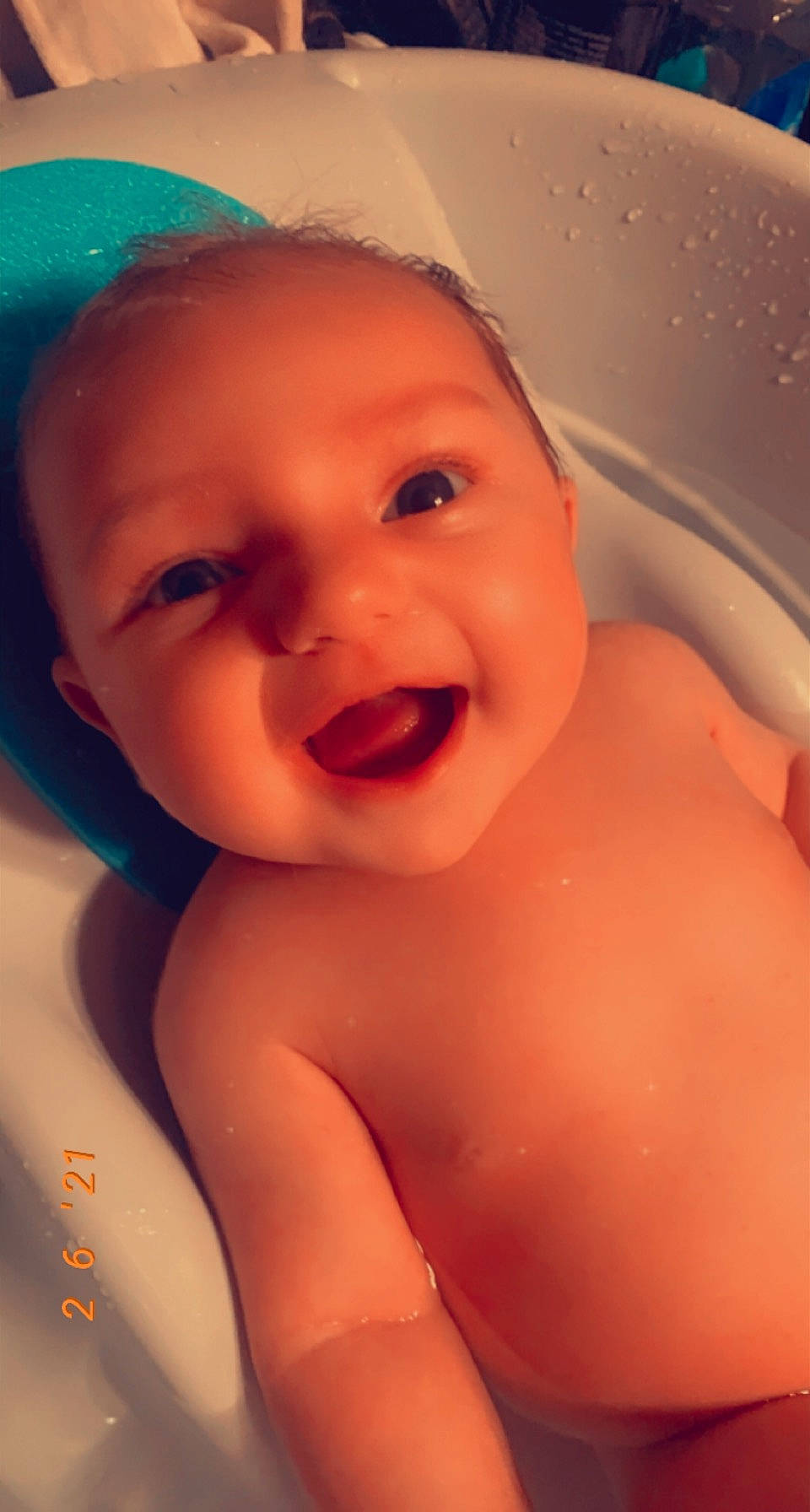 Anna is registered to the contest to win money with this photo: baby, baby_bathing, blue, cheek, ear, eye, eyebrow, eyelash, face, facial_expression, forehead, happy, human_body, iris, lip, mouth, muscle, nose, person, skin