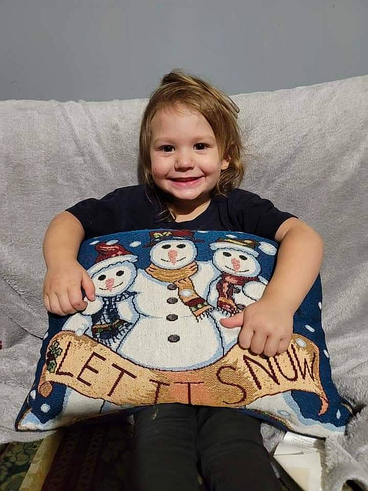 Serenity is registered to the contest to win money with this photo: baby, baby_products, baby_toddler_clothing, child, comfort, couch, facial_expression, fun, happy, joy, lap, linens, pattern, person, play, room, sitting, sleeve, smile, t_shirt