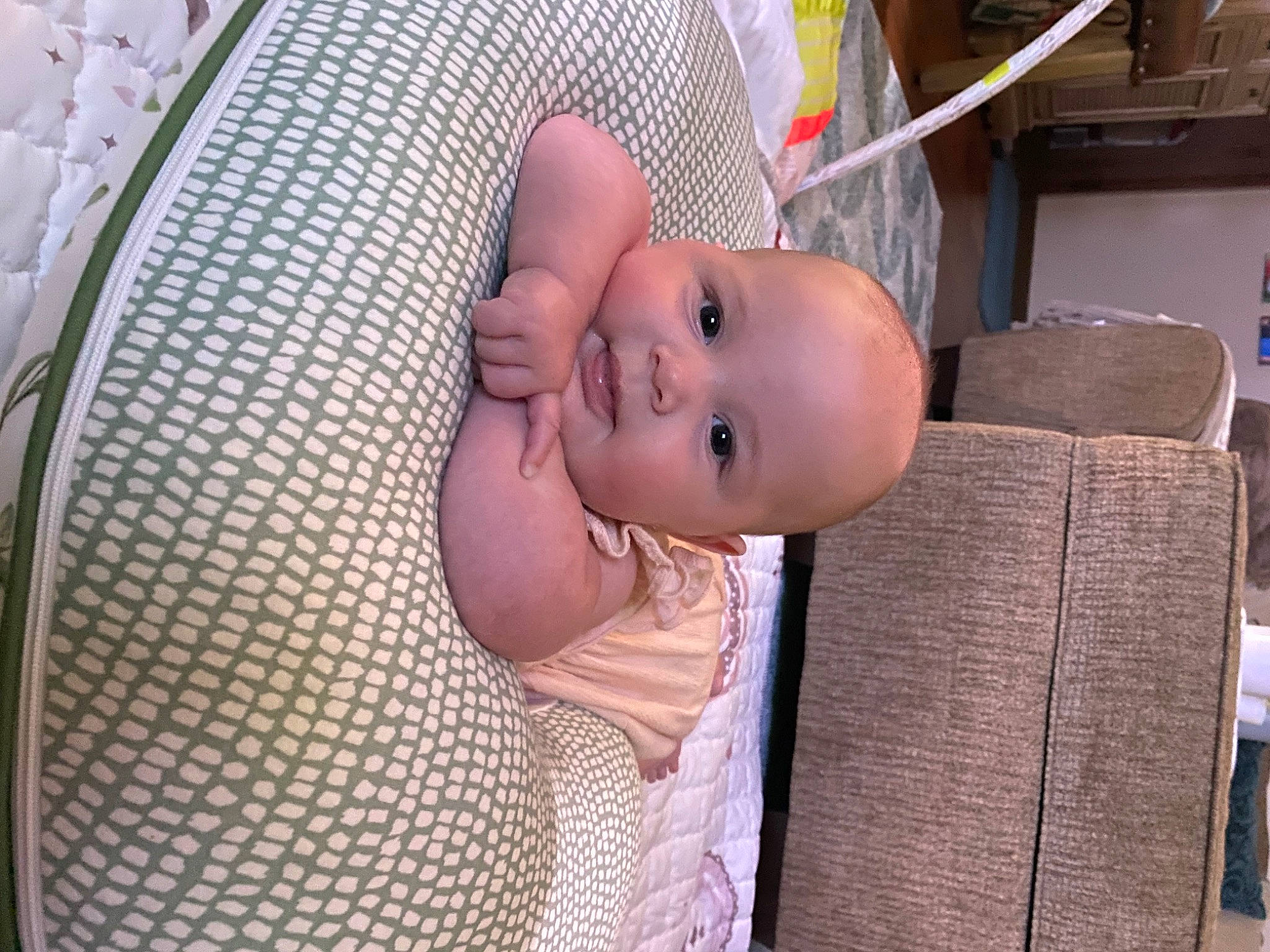 Cora joined the competition — help win amazing prizes! baby, baby_products, baby_safety, baby_toddler_clothing, car_seat, cheek, chest, child, comfort, fun, human_body, infant_bed, iris, linens, pattern, person, room, smile, thumb, toddler