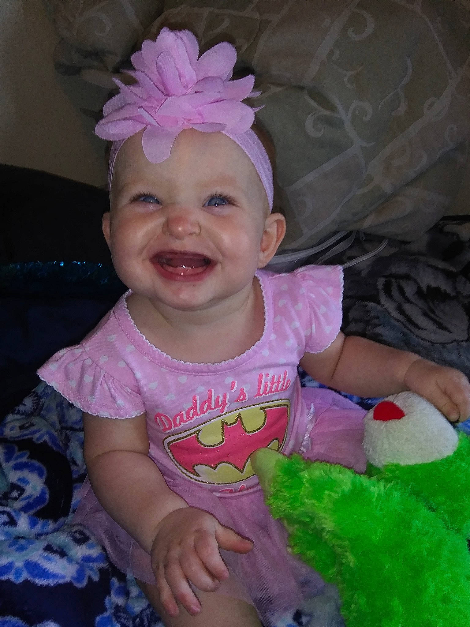 Beatrice is registered to the contest to win money with this photo: baby, baby_toddler_clothing, child, costume, eye, face, fashion_accessory, fun, hair_accessory, head, headband, headgear, headpiece, iris, joy, person, pink, product, purple, skin