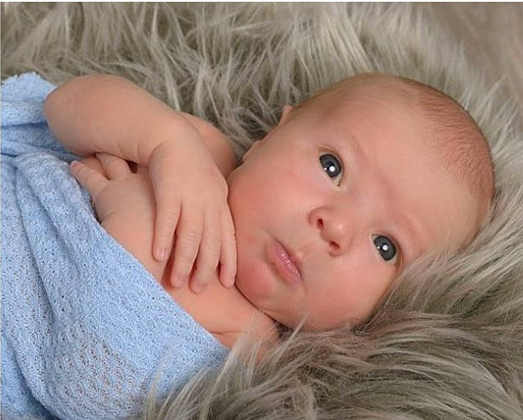 Jasper joined the competition — help win amazing prizes! baby, baby_toddler_clothing, cheek, child, chin, comfort, eyebrow, eyelash, gesture, grass, iris, lip, nail, nose, person, skin, sleeve, thumb, toddler, wood