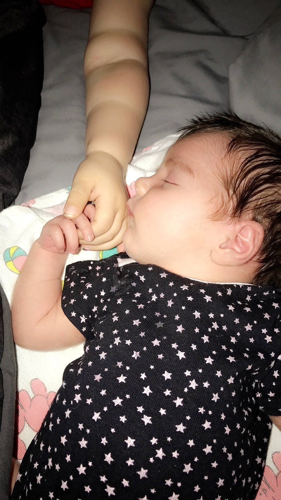 Haddie is registered to the contest to win money with this photo: arm, baby, child, design, finger, gesture, hand, nail, pattern, person, polka_dot, product, skin, toddler