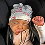 baby, sleeping, infant, hat, car_seat, clothing, pink, white, black, face, hand, cute, peaceful, child, newborn, portrait, cozy, closeup, soft, resting