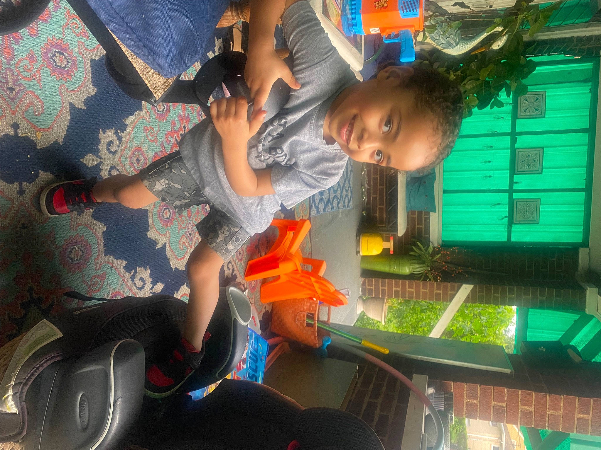 Kayden joined the competition — help win amazing prizes! audio_equipment, auto_part, child, display_device, fun, gadget, games, happy, indoor_games_and_sports, joy, leisure, pattern, person, play, recreation, room, space, t_shirt, toddler, toy