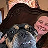 Nikki joined the competition — help win amazing prizes! dog, woman, smile, face, closeup, indoors, headboard, curtain, pet, canine, happy, portrait, cozy, home, person, fur, expression, friendship, animal, companionship