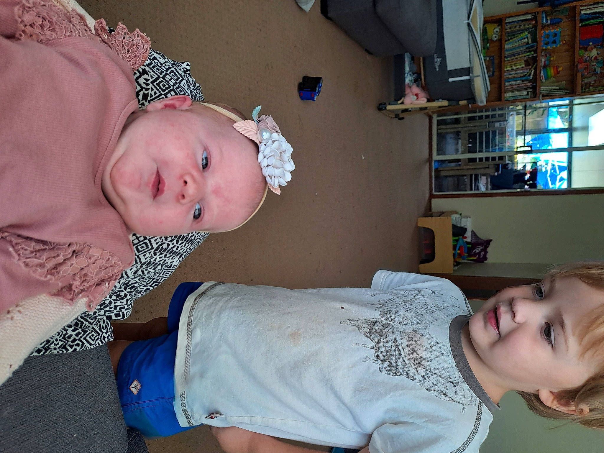 Owen is registered to the contest to win money with this photo: baby, baby_products, baby_toddler_clothing, beauty, cheek, child, comfort, elbow, facial_expression, finger, fun, happy, mammal, mouth, organ, person, room, shelf, skin, smile