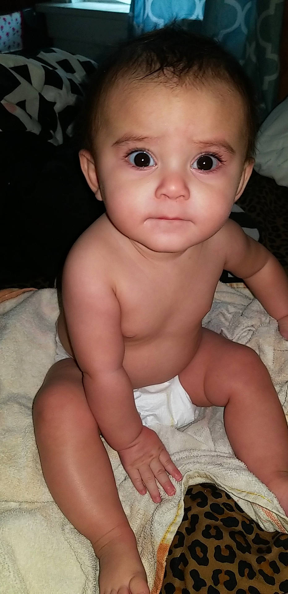 Kopelynn is registered to the contest to win money with this photo: abdomen, black_hair, boy, cheek, child, eye, finger, fun, girl, hand, happiness, infant, iris, leg, mouth, person, sitting, skin, smile, toddler