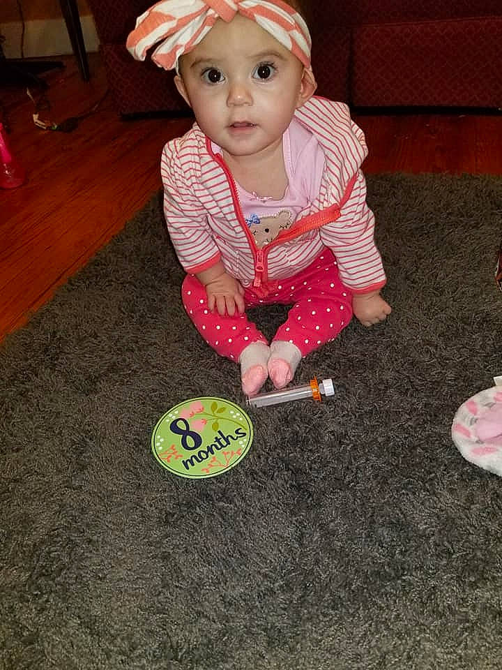 Kopelynn is registered to the contest to win money with this photo: child, day, design, fun, girl, headgear, infant, outerwear, pattern, person, pink, play, product, skin, textile, toddler