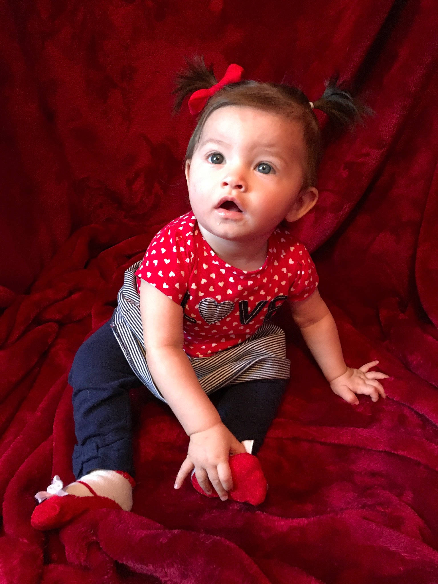 Aliyah Rose is registered to the contest to win money with this photo: baby, baby_toddler_clothing, child, child_model, pattern, person, photography, pink, portrait, red, sitting, smile, surprise, toddler