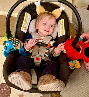 Mason is registered to the contest to win money with this photo: baby, baby_carriage, baby_in_car_seat, baby_products, baby_toddler_clothing, bag, car_seat, chair, comfort, infant_bed, joy, luggage_and_bags, person, product, seat_belt, sitting, smile, steering_wheel, stuffed_toy, toddler