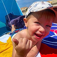 Elio a rejoint le concours — aidez-le/la à gagner de superbes lots ! architecture, baby, baseballcap, bodypart, building, camping, cap, clothing, face, finger, hand, hat, head, outdoors, person, photography, portrait, shelter, summer, tent