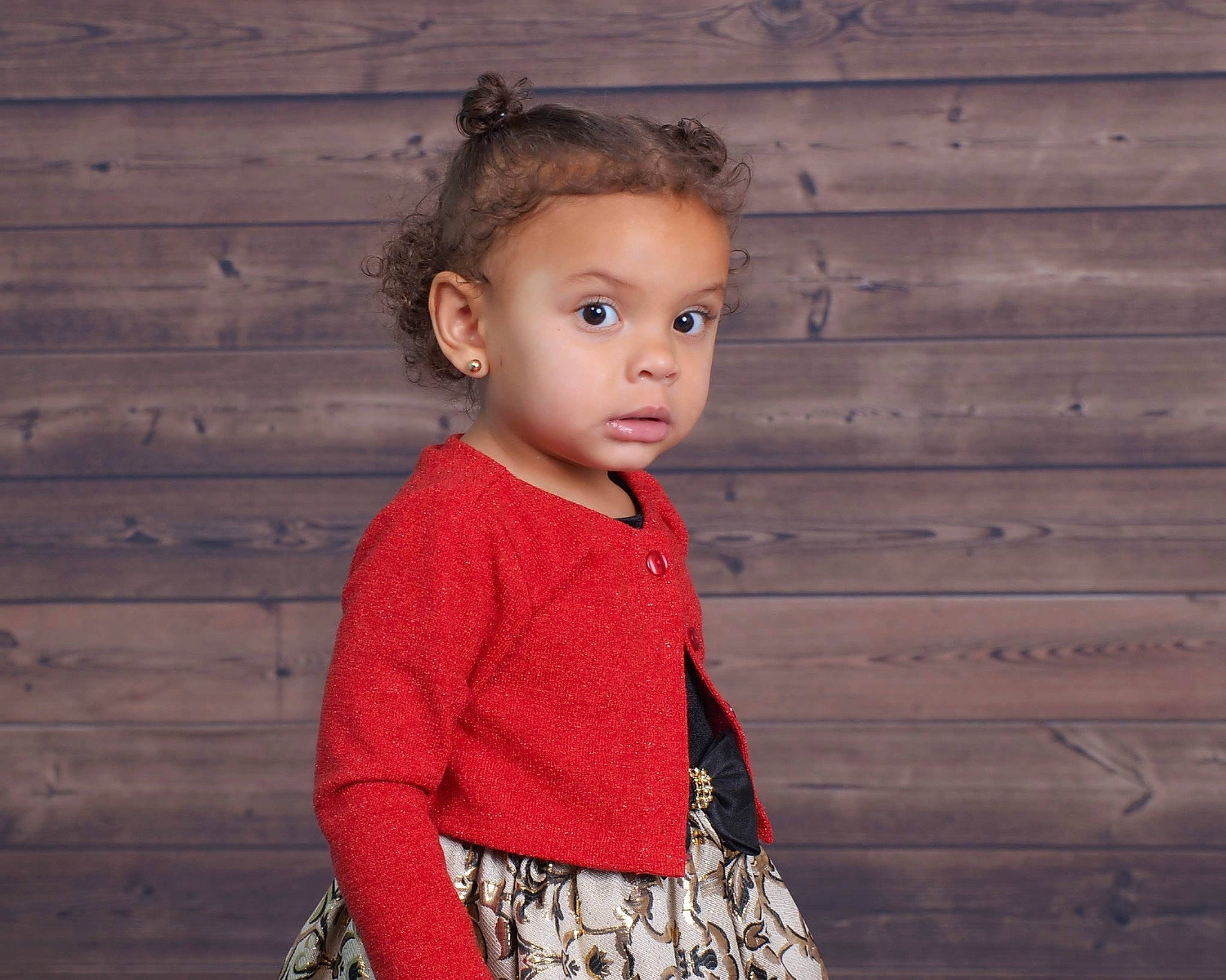 Mireya is registered to the contest to win money with this photo: child, child_model, clothing, jacket, neck, outerwear, pattern, person, sleeve, standing, sweater, t_shirt, toddler, top