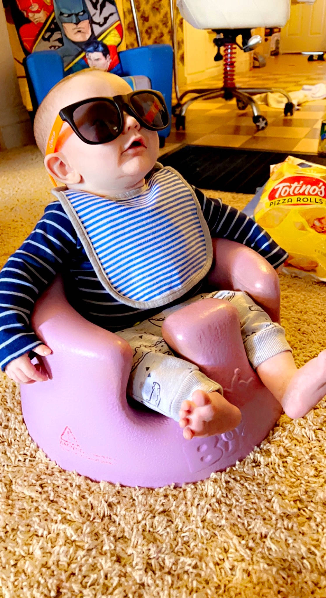 Ryder is registered to the contest to win money with this photo: baby, baby_toddler_clothing, eyewear, finger, fun, glasses, goggles, hand, head, headgear, human_body, leg, mouth, person, shoe, sleeve, summer, sunglasses, thigh, vision_care