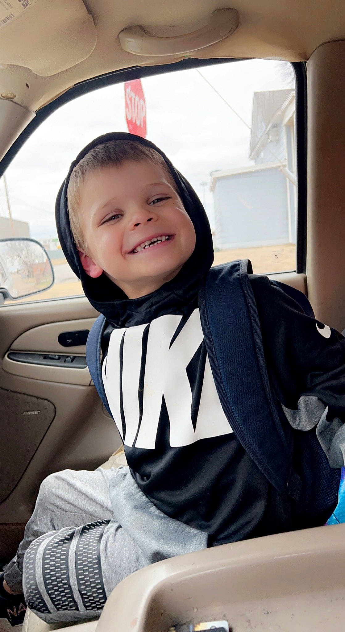 Leighton is registered to the contest to win money with this photo: auto_part, automotive_design, automotive_exterior, automotive_lighting, car, car_seat, car_seat_cover, comfort, happy, head_restraint, joy, motor_vehicle, person, personal_luxury_car, sleeve, smile, steering_wheel, toddler, vehicle, vehicle_door