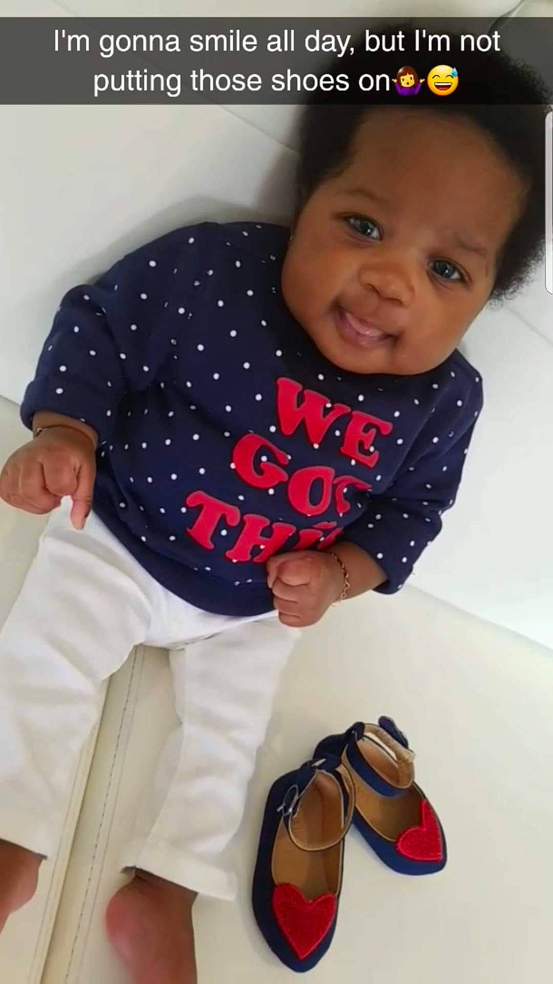 Kimani joined the competition — help win amazing prizes! arm, baby, baby_toddler_clothing, cheek, child, cool, footwear, happy, nose, outerwear, person, product, shoe, sitting, skin, sleeve, smile, t_shirt, toddler