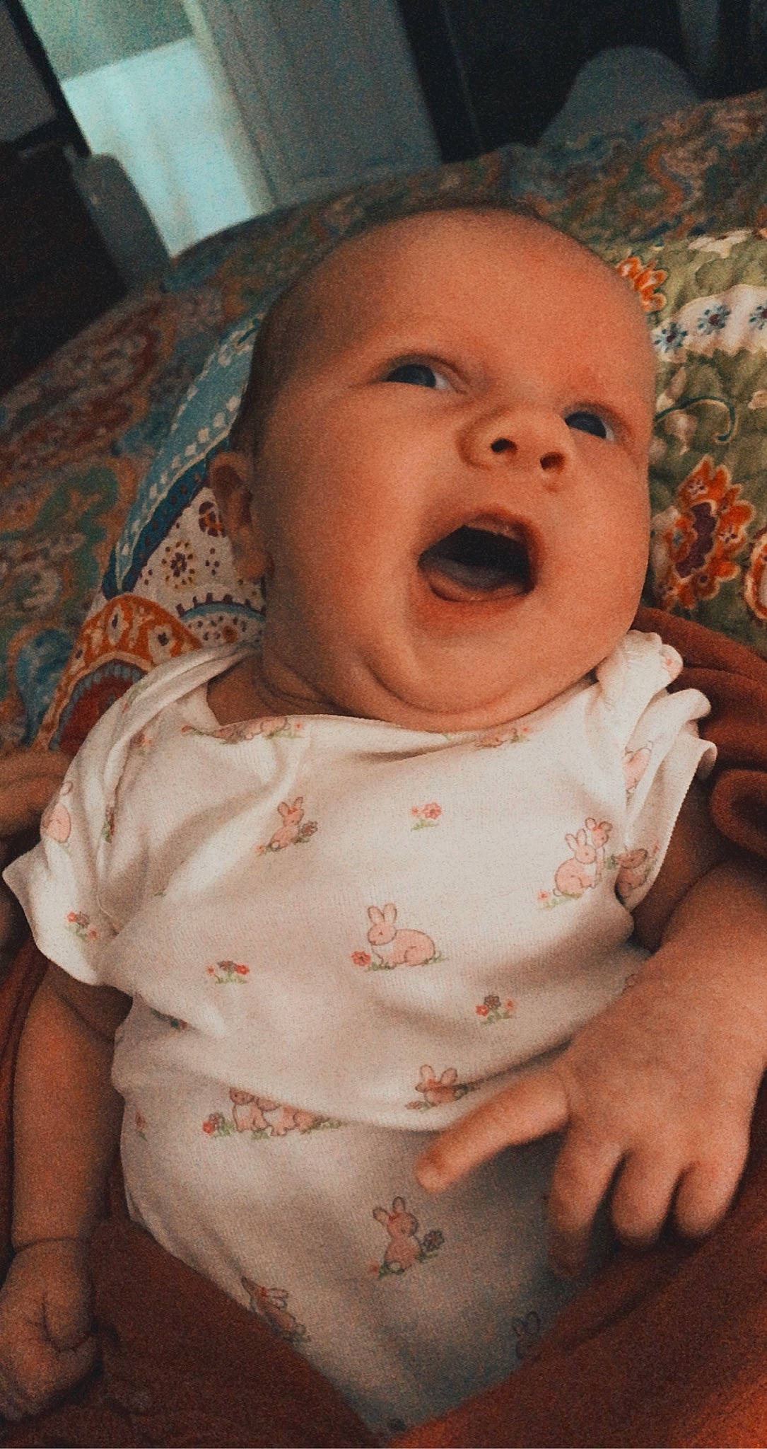 Laikyn is registered to the contest to win money with this photo: baby, baby_toddler_clothing, cheek, comfort, eye, face, finger, happy, head, iris, lip, mammal, mouth, nose, person, pink, skin, sleeve, smile, textile