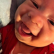 Dylan is registered to the contest to win money with this photo: cheek, chin, eye, eyebrow, eyelash, facial_expression, forehead, gesture, happy, head, iris, jaw, lip, mammal, mouth, neck, nose, skin, sleeve, smile