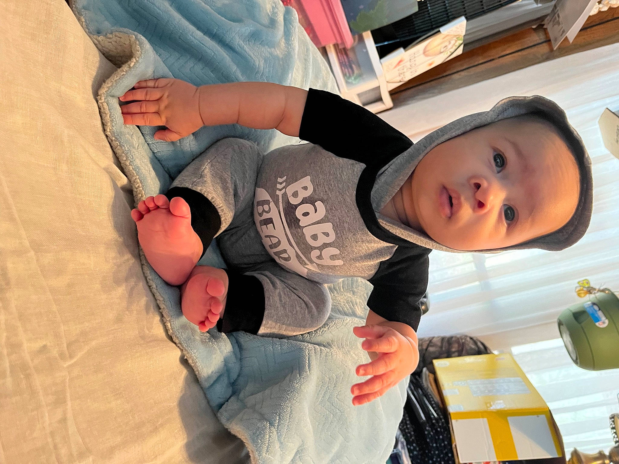Dylan joined the competition — help win amazing prizes! baby, child, comfort, denim, elbow, finger, foot, fun, gesture, human_leg, jeans, knee, leisure, mouth, person, sitting, t_shirt, thigh, toddler, tree
