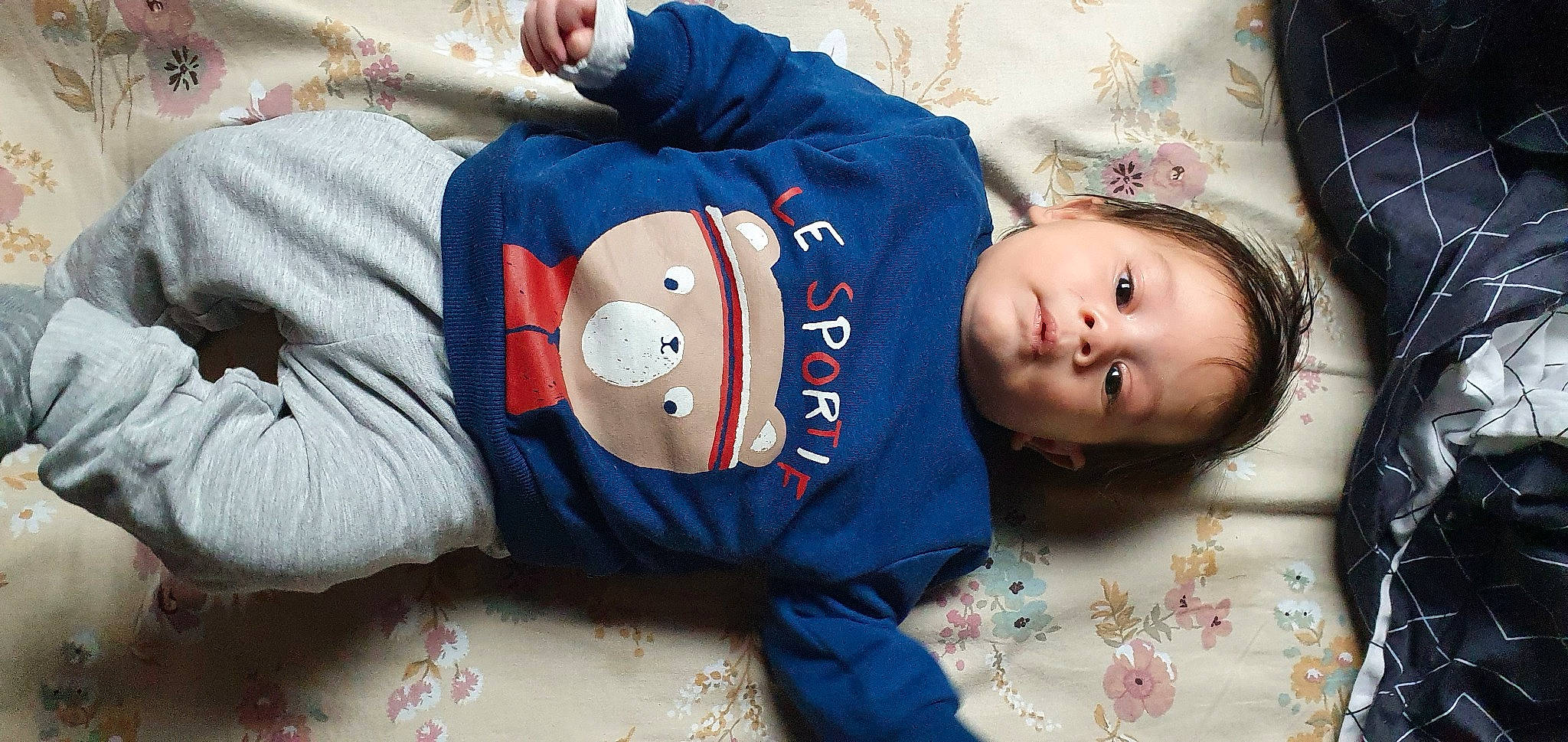 Eden participe au concours pour gagner de l'argent avec cette photo : baby, baby_products, baby_sleeping, baby_toddler_clothing, cheek, child, comfort, face, fur, happy, hat, pattern, person, personal_protective_equipment, portrait_photography, sitting, skin, sleeve, toddler, winter