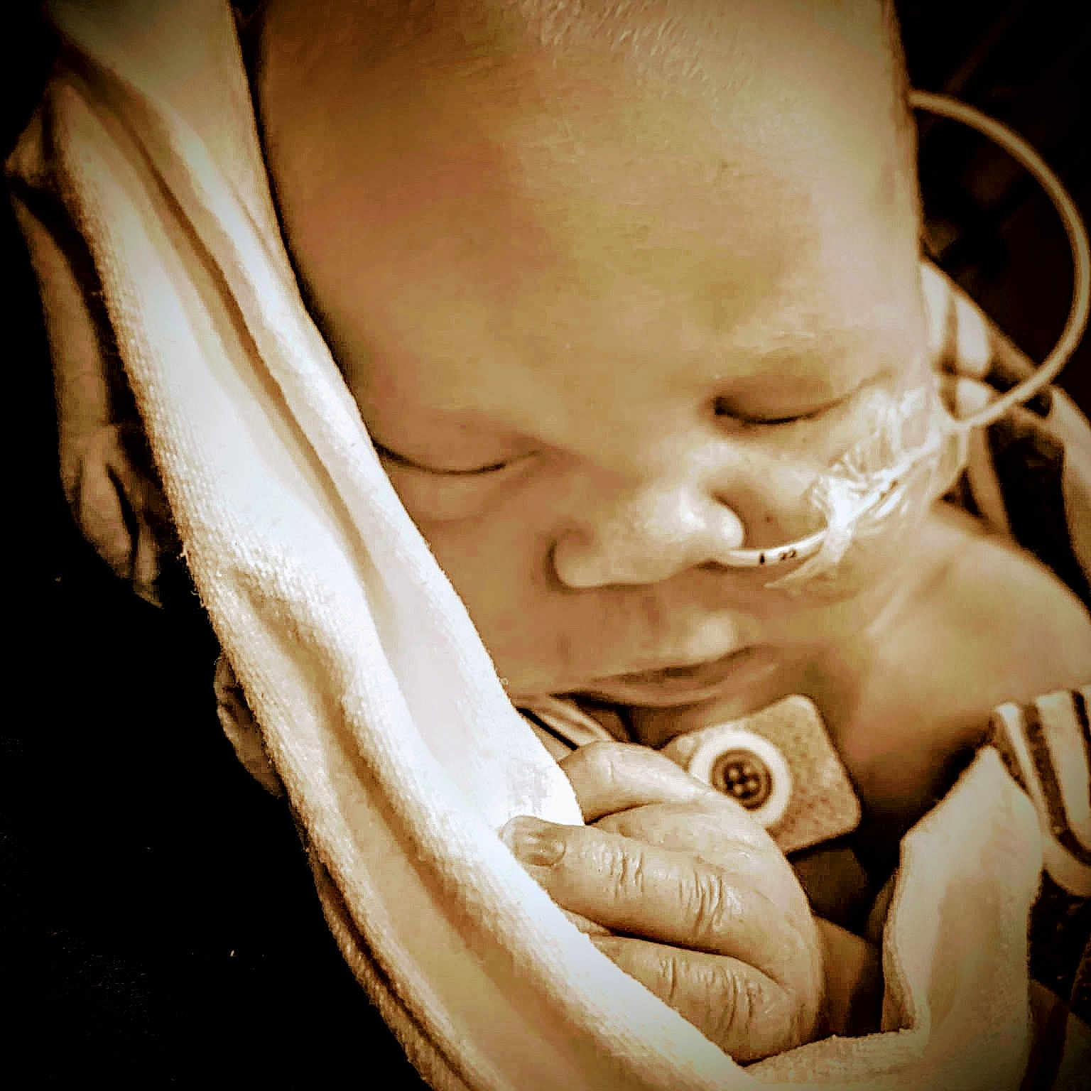 Lynnyrd is registered to the contest to win money with this photo: arm, baby, baby_toddler_clothing, cheek, chin, comfort, ear, eye, eyebrow, flash_photography, gesture, hairstyle, happy, iris, lip, mouth, neck, nose, skin, toddler