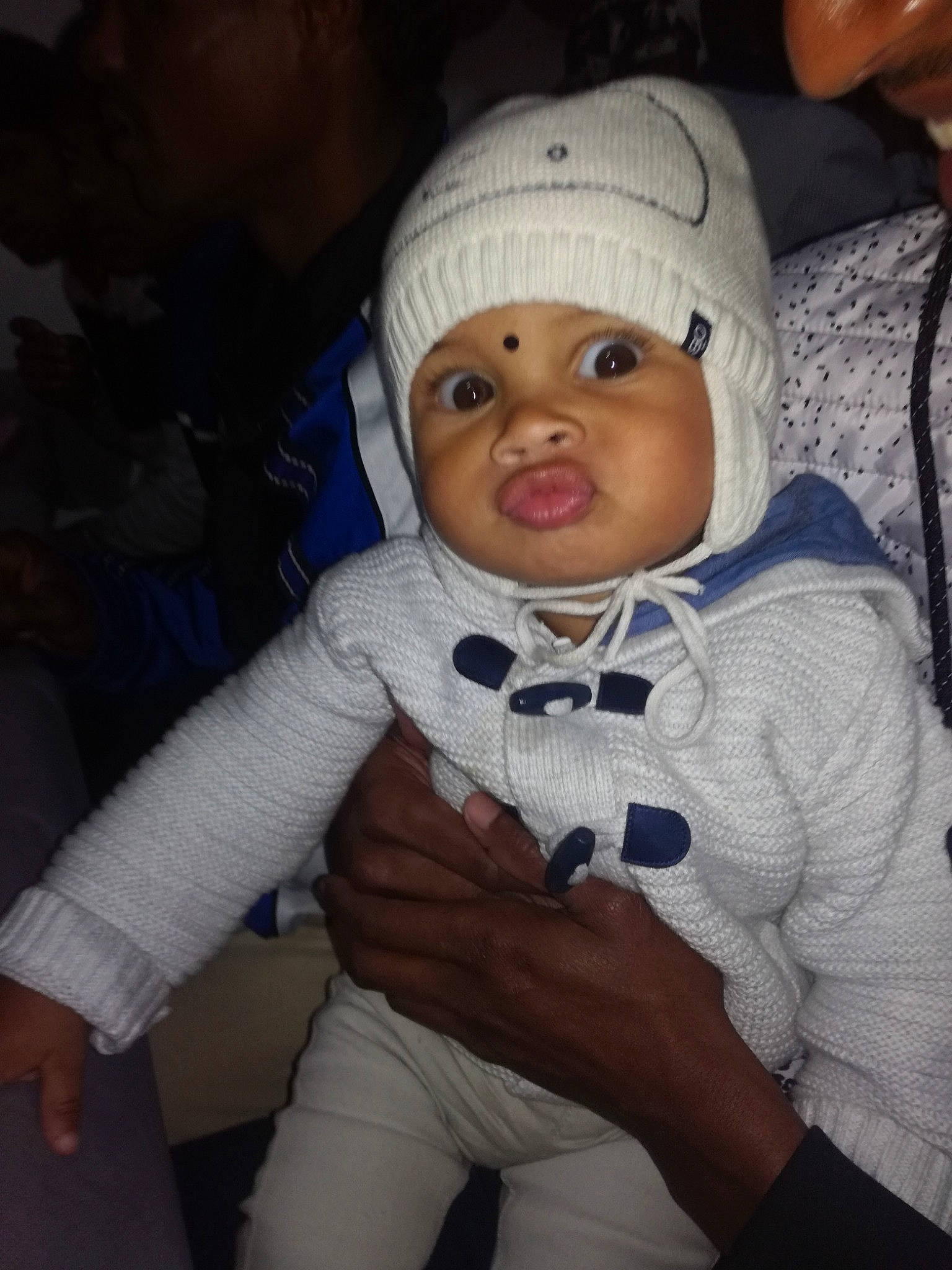 Kéran participe au concours pour gagner de l'argent avec cette photo : beanie, cap, cheek, child, cool, day, head, headgear, headwear, human, human_hair_color, infant, knit_cap, knitting, nose, outerwear, person, product, skin, smile