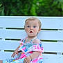 toddler, child, baby, dress, colorful, bench, white_bench, outdoor, greenery, nature, portrait, cute, sitting, curious, blue_eyes, summer, baby_girl, innocent, expression, soft_light
