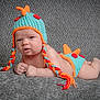 Colton joined the competition — help win amazing prizes! baby, beanie, blanket, bodypart, bonnet, cap, clothing, costume, face, finger, glove, hand, hat, head, newborn, person, photography, portrait, swimwear