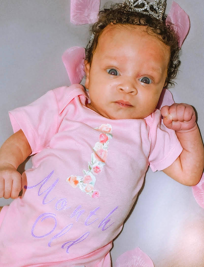Princess Kali joined the competition — help win amazing prizes! baby, baby_toddler_clothing, brown_hair, cheek, child, ear, eye, face, fashion_accessory, forehead, hair_accessory, head, headband, headgear, headpiece, lip, person, pink, skin, smile