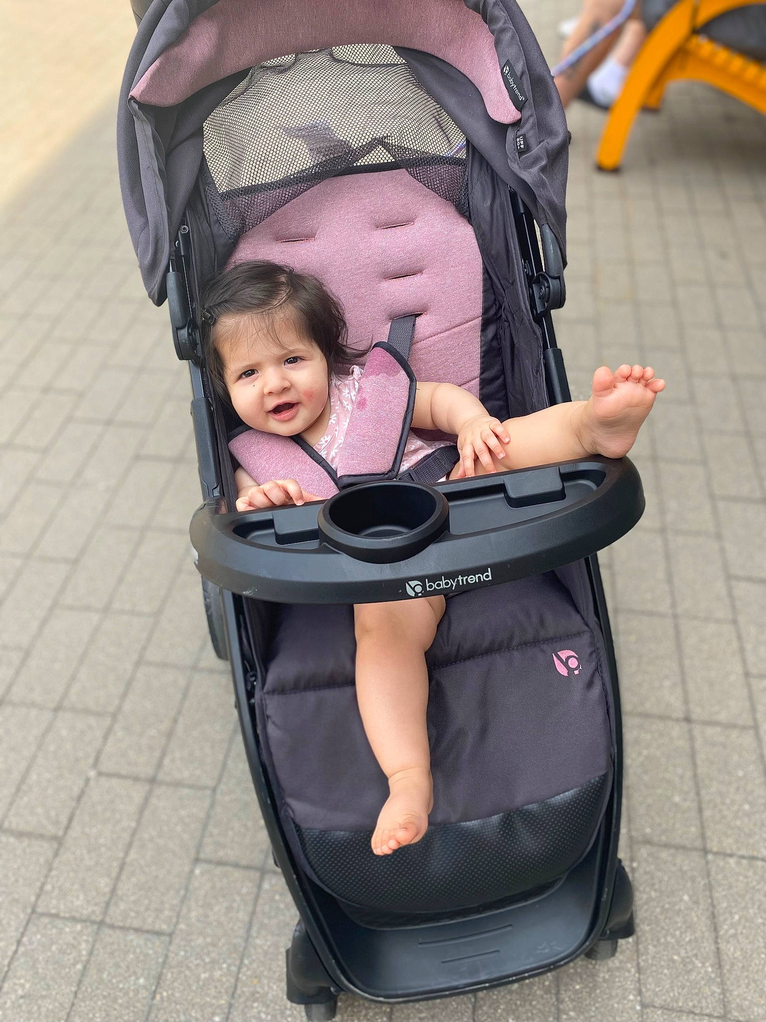 Samara is registered to the contest to win money with this photo: auto_part, baby, baby_carriage, baby_products, baby_safety, baby_toddler_clothing, bag, chair, child, comfort, event, fashion_accessory, fun, lap, leisure, person, recreation, sitting, tire, toddler