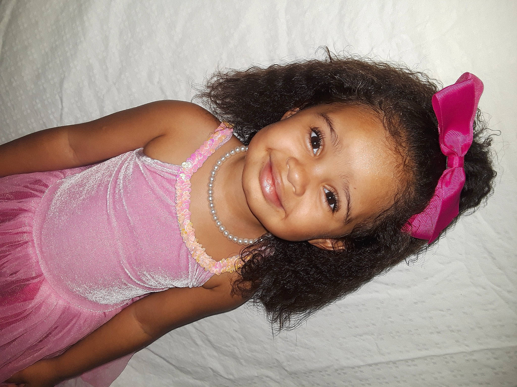 Mercedes is registered to the contest to win money with this photo: arm, black_hair, cheek, chin, dress, eye, eyebrow, face, flash_photography, fun, happy, head, human_body, iris, joy, magenta, person, pink, skin, smile